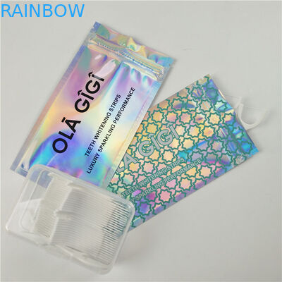 ไหมขัดฟันด้านหน้าใสมันวาวแขวนหลุมถุงพลาสติกอลูมิเนียมฟอยล์ที่กำหนดเองบรรจุภัณฑ์ถุงซิปล็อค