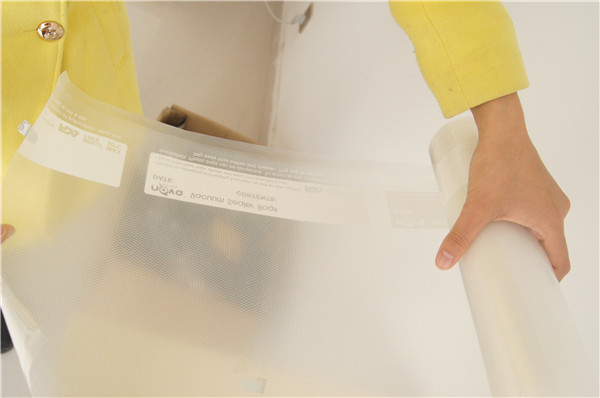 พลาสติกไนล่อนวัสดุ PE และการจัดการพื้นผิวลายนูนในเชิงพาณิชย์เกรดอาหารเครื่องดูดฝุ่นเครื่องปิดผนึกสูญญากาศบรรจุภัณฑ์ถุงม้วน